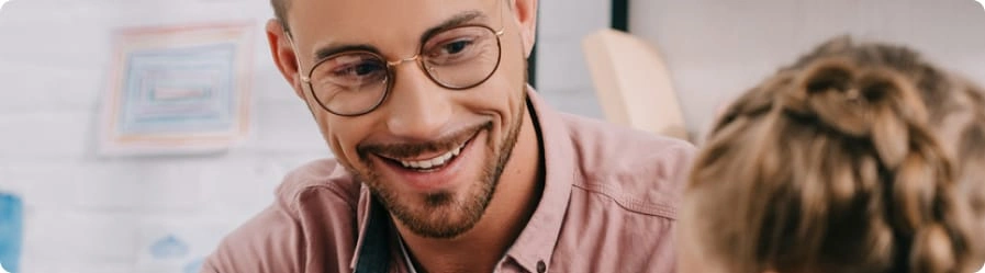An image of a smiling speech-language pathologist.