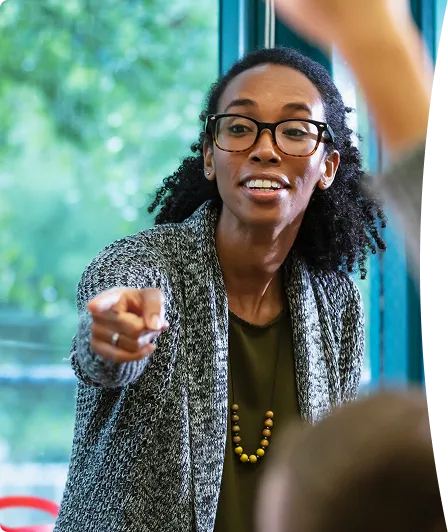 Educator working with students in classroom